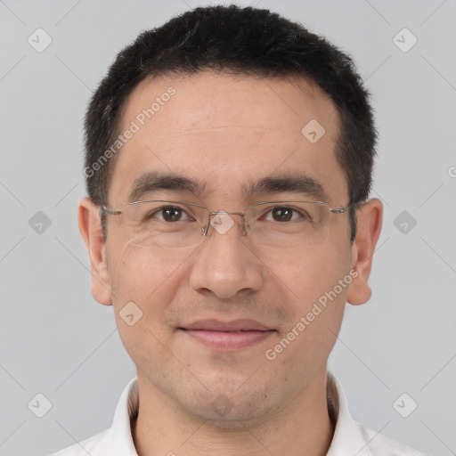 Joyful white adult male with short  brown hair and brown eyes