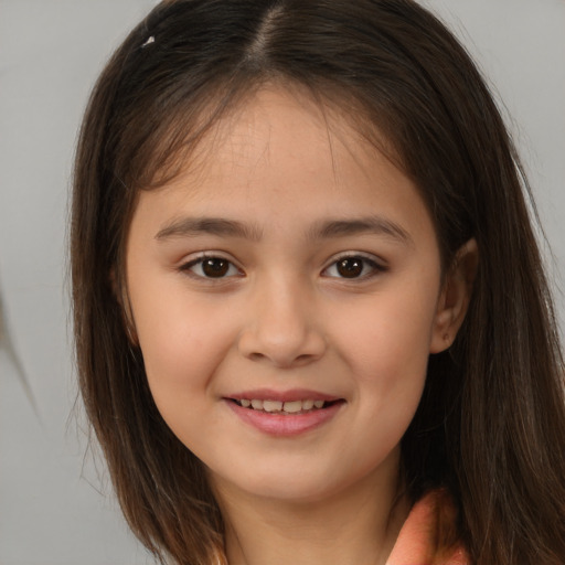 Joyful white child female with long  brown hair and brown eyes