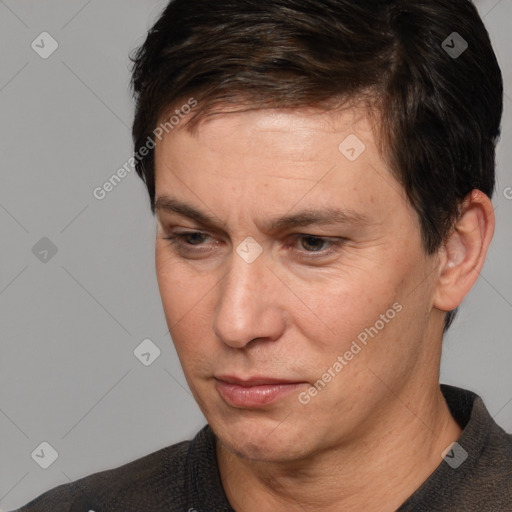 Neutral white adult male with short  brown hair and brown eyes