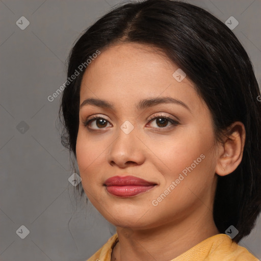 Joyful asian young-adult female with medium  brown hair and brown eyes