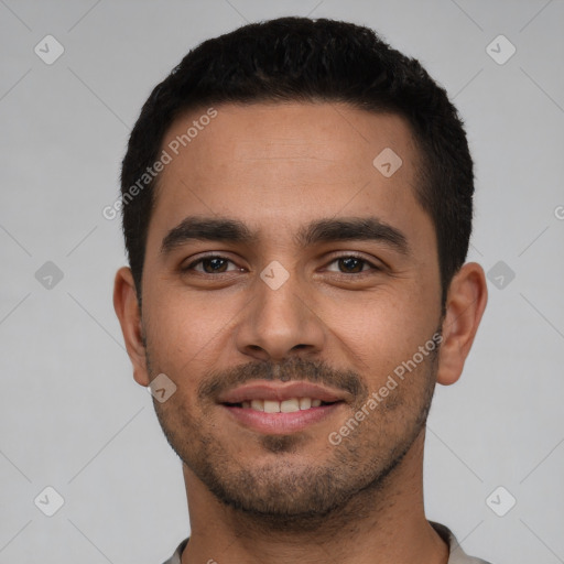 Joyful white young-adult male with short  black hair and brown eyes