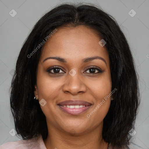 Joyful black young-adult female with medium  brown hair and brown eyes