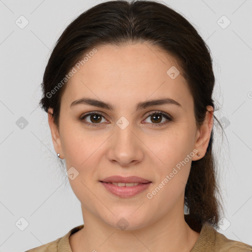 Joyful white young-adult female with medium  brown hair and brown eyes