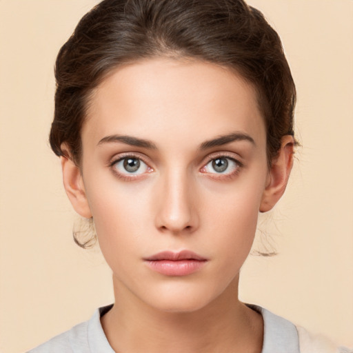 Neutral white young-adult female with medium  brown hair and brown eyes