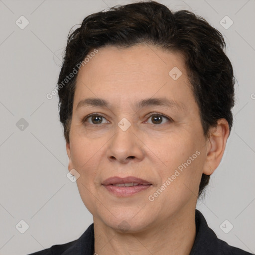 Joyful white adult female with short  brown hair and brown eyes