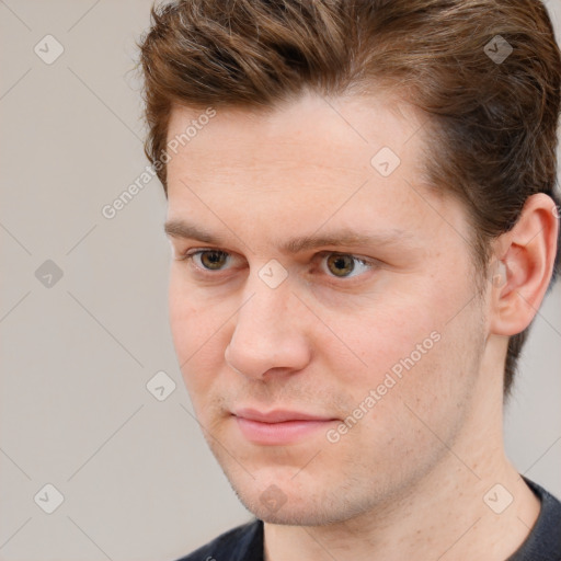 Neutral white young-adult male with short  brown hair and grey eyes