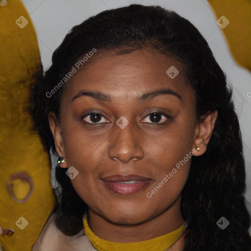 Joyful black young-adult female with long  brown hair and brown eyes
