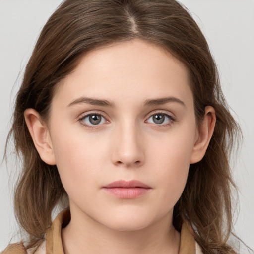 Neutral white young-adult female with medium  brown hair and grey eyes