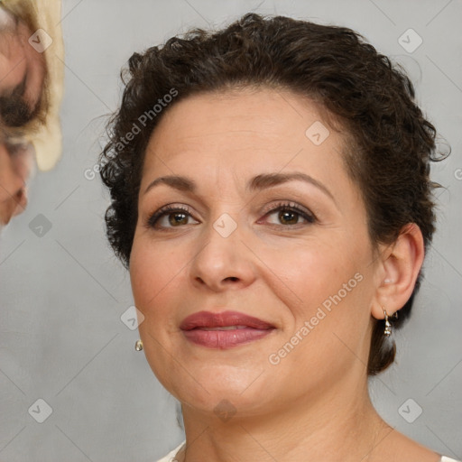 Joyful white adult female with short  brown hair and brown eyes