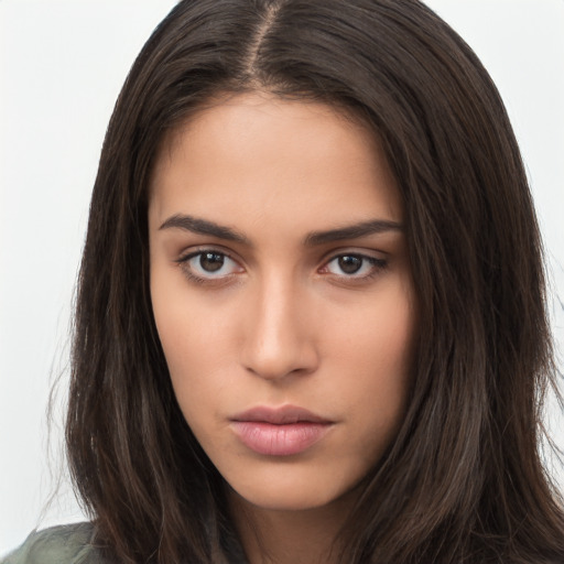 Neutral white young-adult female with long  brown hair and brown eyes