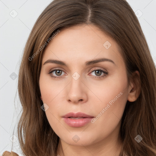 Neutral white young-adult female with long  brown hair and brown eyes