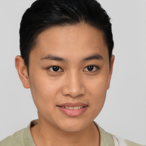 Joyful asian young-adult female with short  brown hair and brown eyes