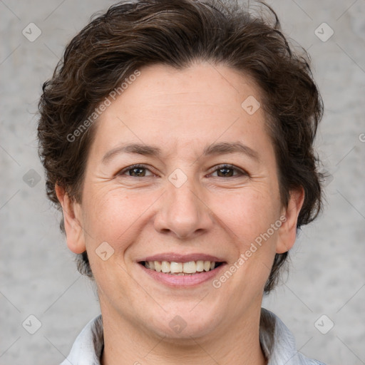 Joyful white adult female with short  brown hair and brown eyes