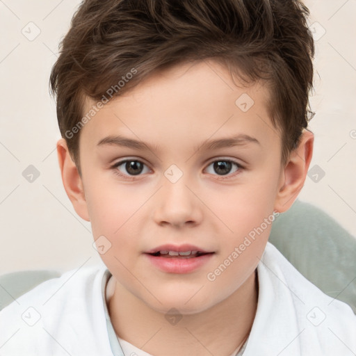 Joyful white child male with short  brown hair and brown eyes