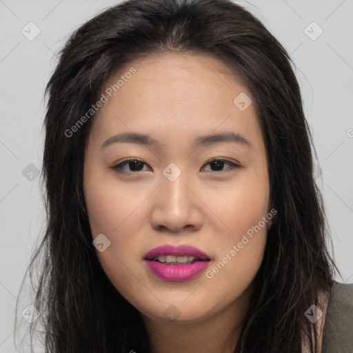 Joyful asian young-adult female with long  brown hair and brown eyes