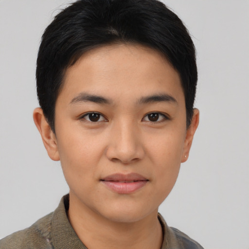Joyful asian young-adult female with short  brown hair and brown eyes