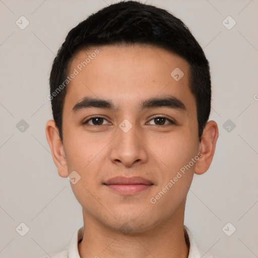 Joyful latino young-adult male with short  brown hair and brown eyes