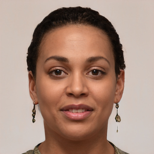 Joyful latino young-adult female with short  brown hair and brown eyes