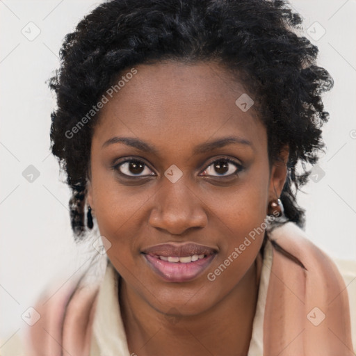 Joyful black young-adult female with long  brown hair and brown eyes