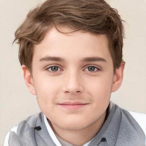 Joyful white child male with short  brown hair and brown eyes