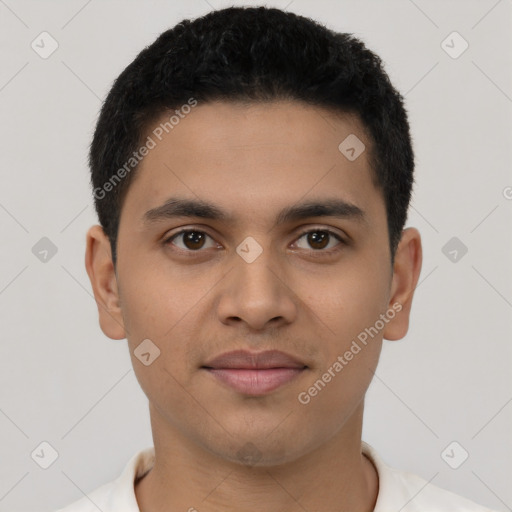 Joyful latino young-adult male with short  brown hair and brown eyes