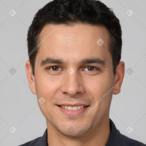 Joyful white young-adult male with short  brown hair and brown eyes