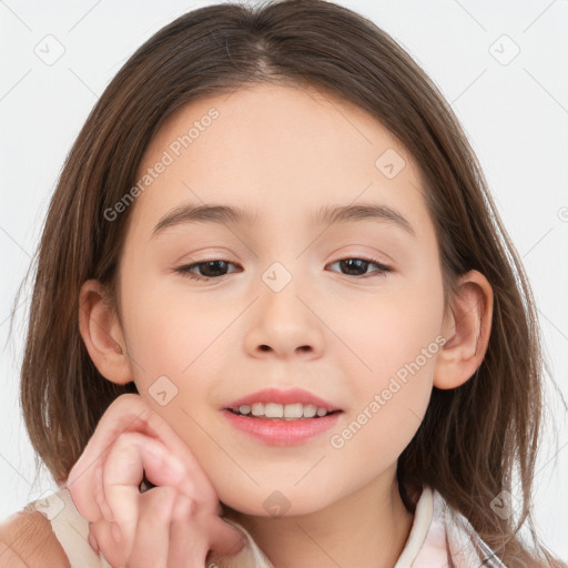 Joyful white child female with medium  brown hair and brown eyes