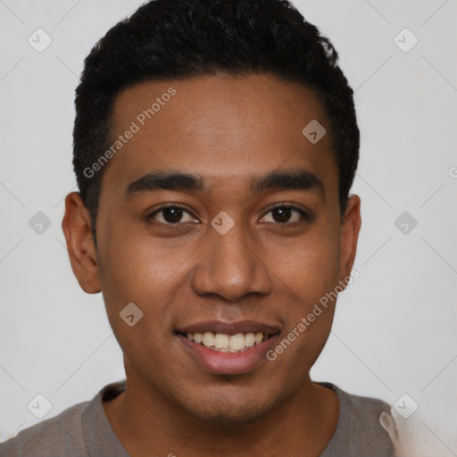 Joyful latino young-adult male with short  black hair and brown eyes