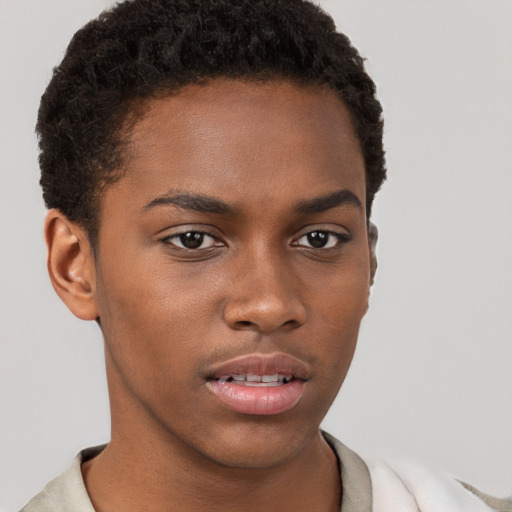 Neutral black young-adult male with short  brown hair and brown eyes