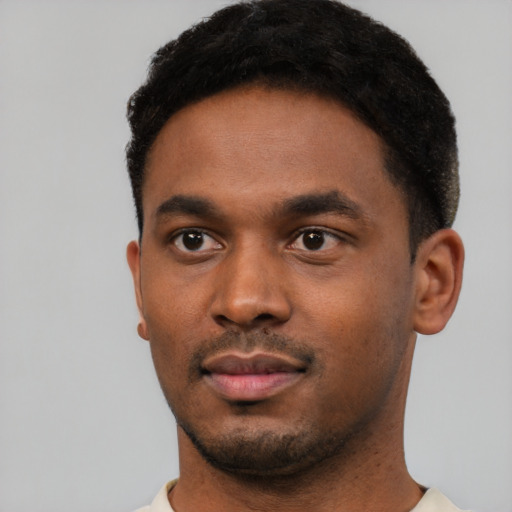 Neutral black young-adult male with short  black hair and brown eyes