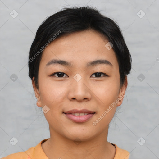 Joyful asian young-adult female with short  black hair and brown eyes