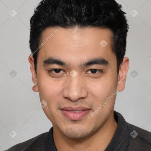 Joyful white young-adult male with short  black hair and brown eyes