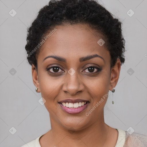 Joyful black young-adult female with short  brown hair and brown eyes