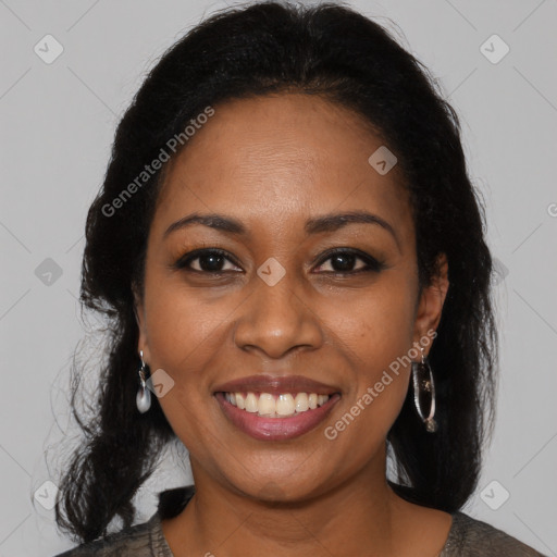 Joyful black young-adult female with medium  brown hair and brown eyes