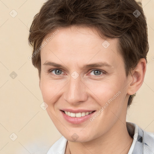 Joyful white young-adult female with short  brown hair and brown eyes