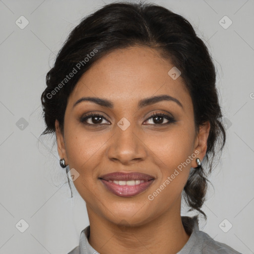 Joyful black young-adult female with medium  brown hair and brown eyes