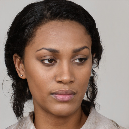 Neutral latino young-adult female with medium  black hair and brown eyes