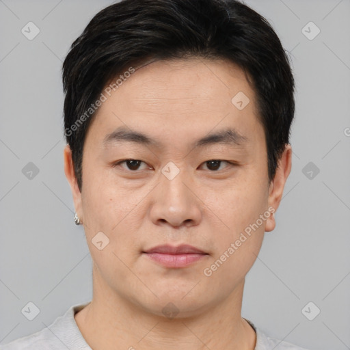 Neutral asian young-adult male with short  brown hair and brown eyes