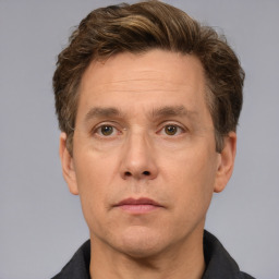 Neutral white adult male with short  brown hair and brown eyes