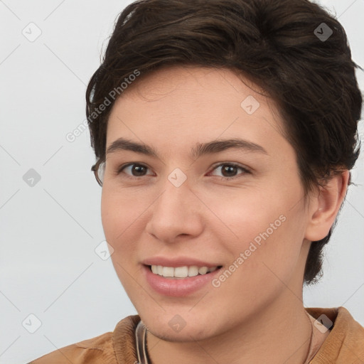 Joyful white young-adult female with short  brown hair and brown eyes