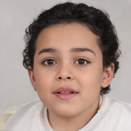 Joyful white child female with short  brown hair and brown eyes