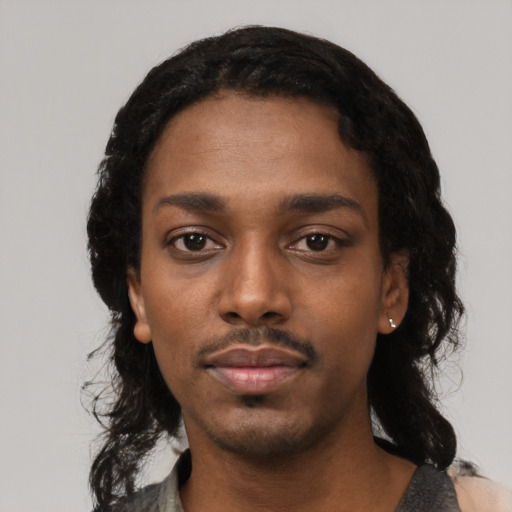 Neutral black young-adult female with short  black hair and brown eyes
