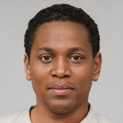 Neutral black young-adult male with short  brown hair and brown eyes