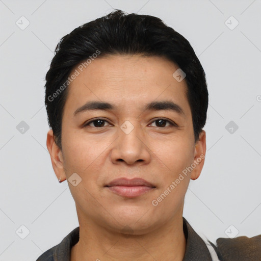 Joyful latino young-adult male with short  black hair and brown eyes