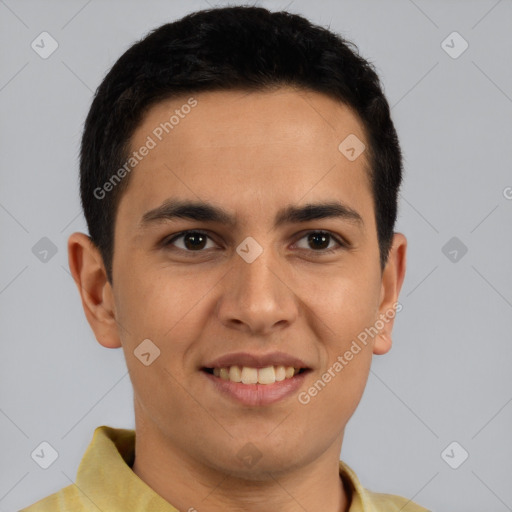 Joyful latino young-adult male with short  brown hair and brown eyes