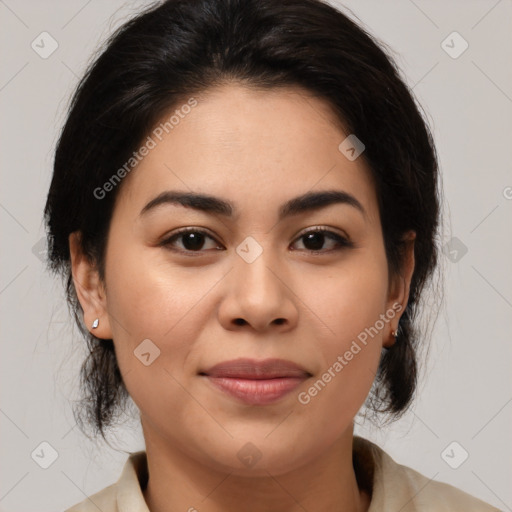 Joyful latino young-adult female with medium  brown hair and brown eyes