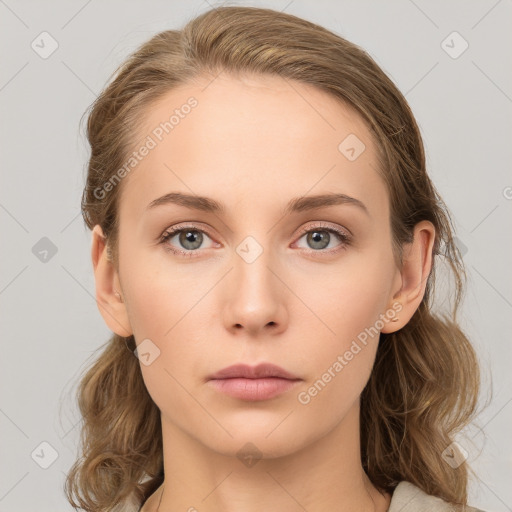 Neutral white young-adult female with medium  brown hair and grey eyes