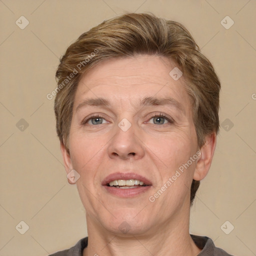 Joyful white adult female with short  brown hair and brown eyes