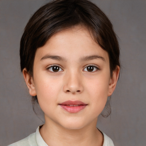 Joyful white child female with medium  brown hair and brown eyes