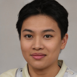 Joyful asian young-adult female with short  brown hair and brown eyes